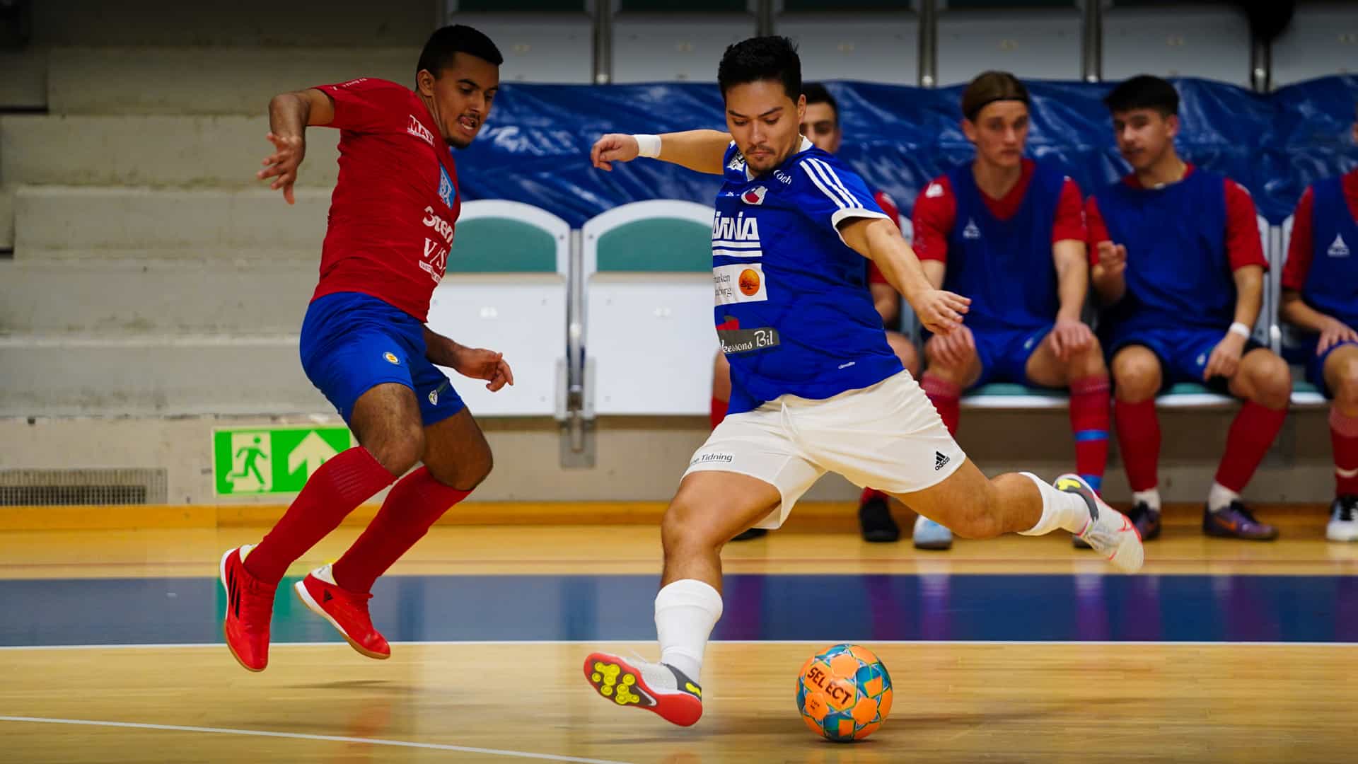 futsal player ready to hit the ball