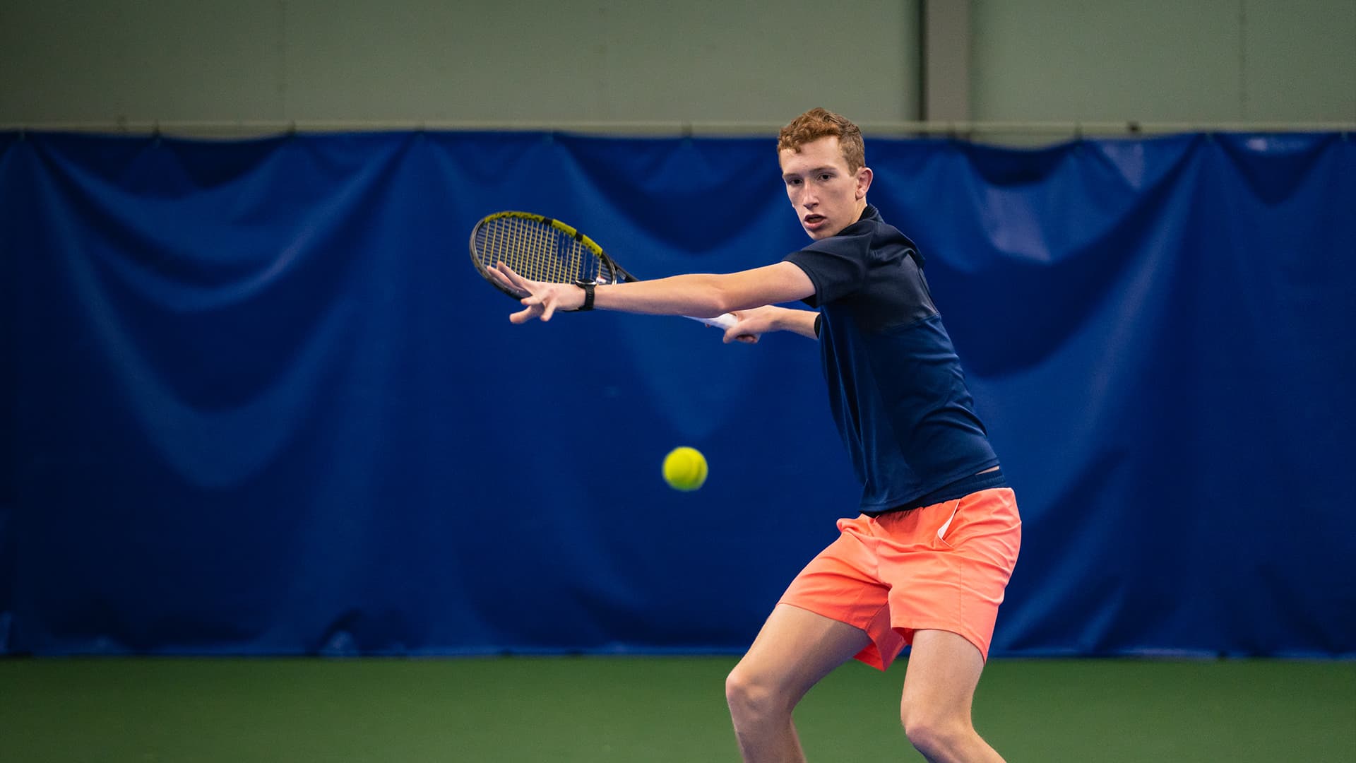 tennis player ready to hit the ball