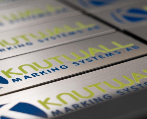 Product shot of a silver label