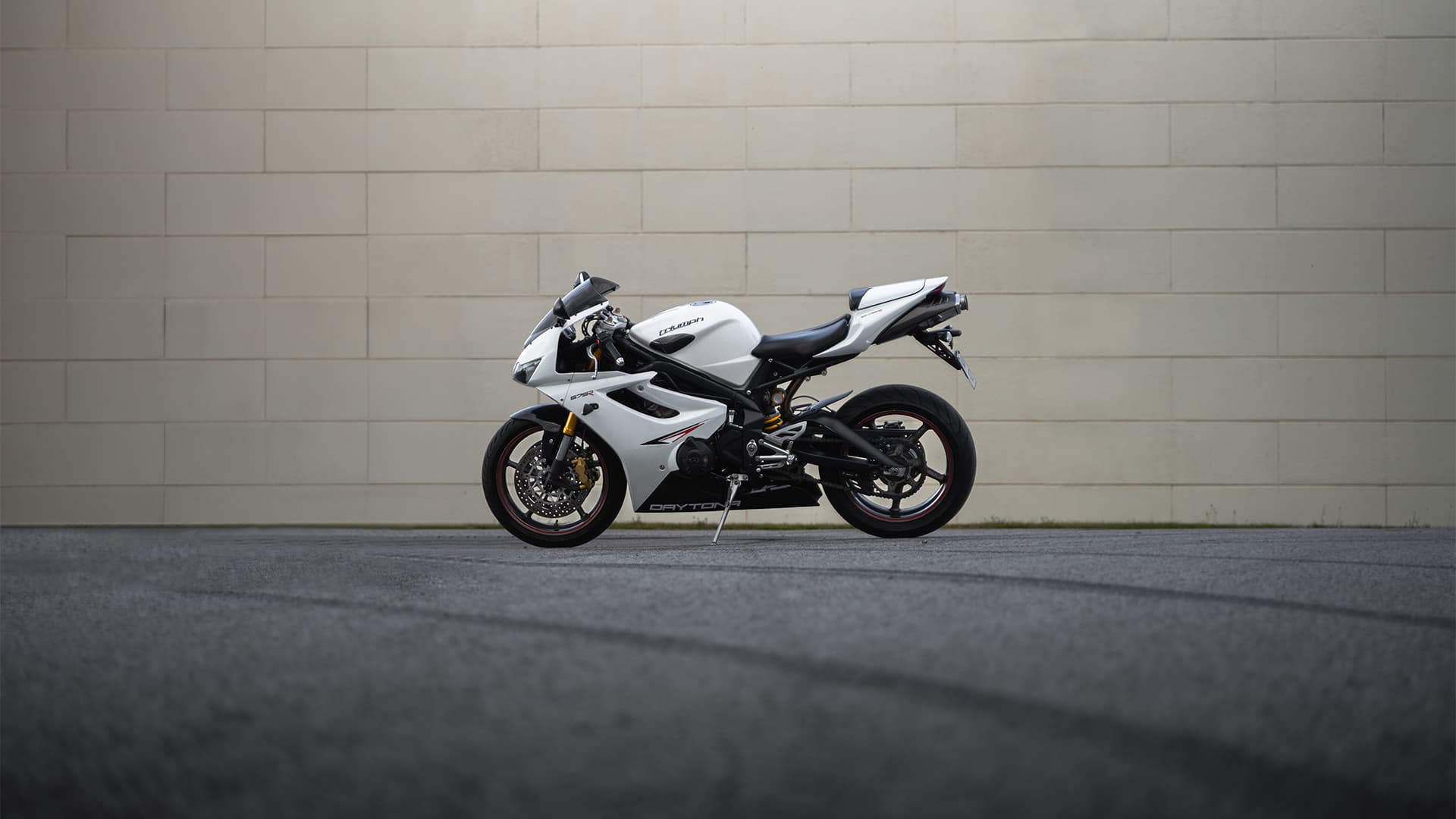 Sportbike against a white wall