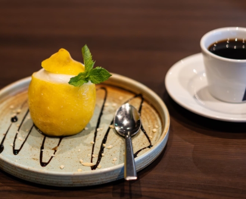lemon dessert with coffee in a restaurant