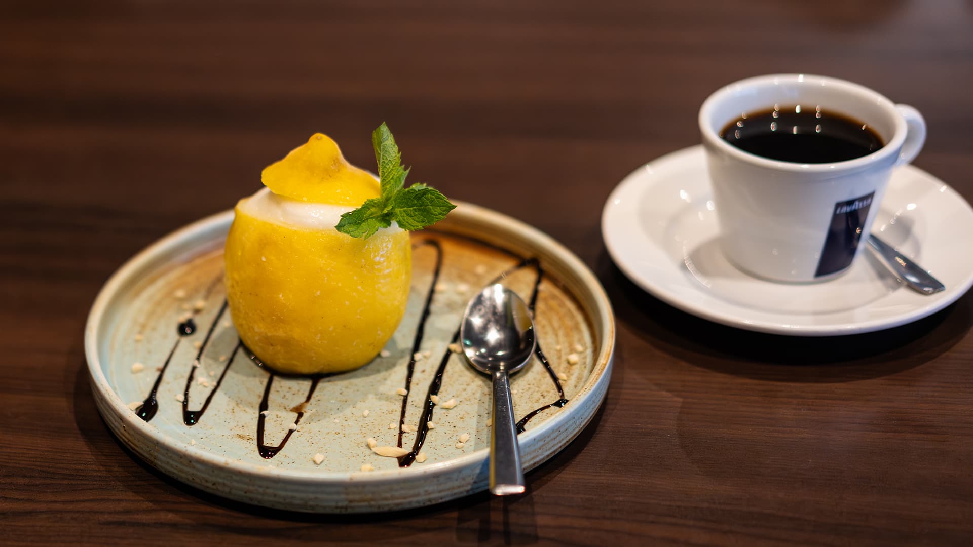 lemon dessert with coffee in a restaurant