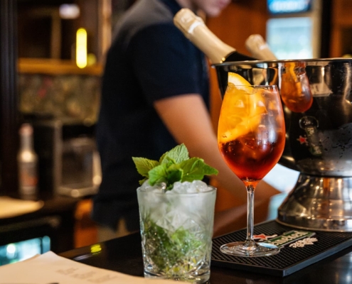 drinks prepared and ready at a bar