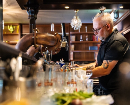 bartender doing a drink in a bar