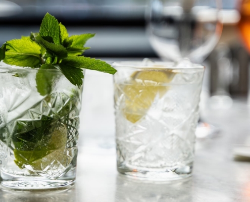 close up of two drinks at a restaurant
