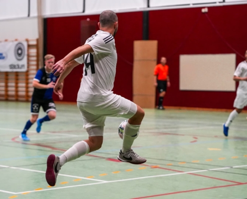 player receiving a ball during a futsal game