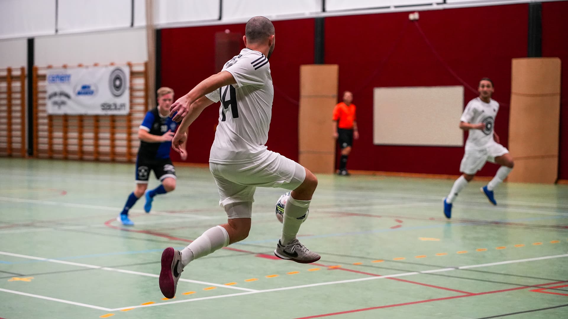 player receiving a ball during a futsal game