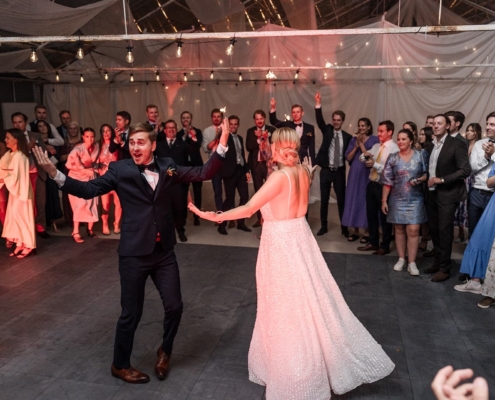 bride and groom dancing at their wedding celebration