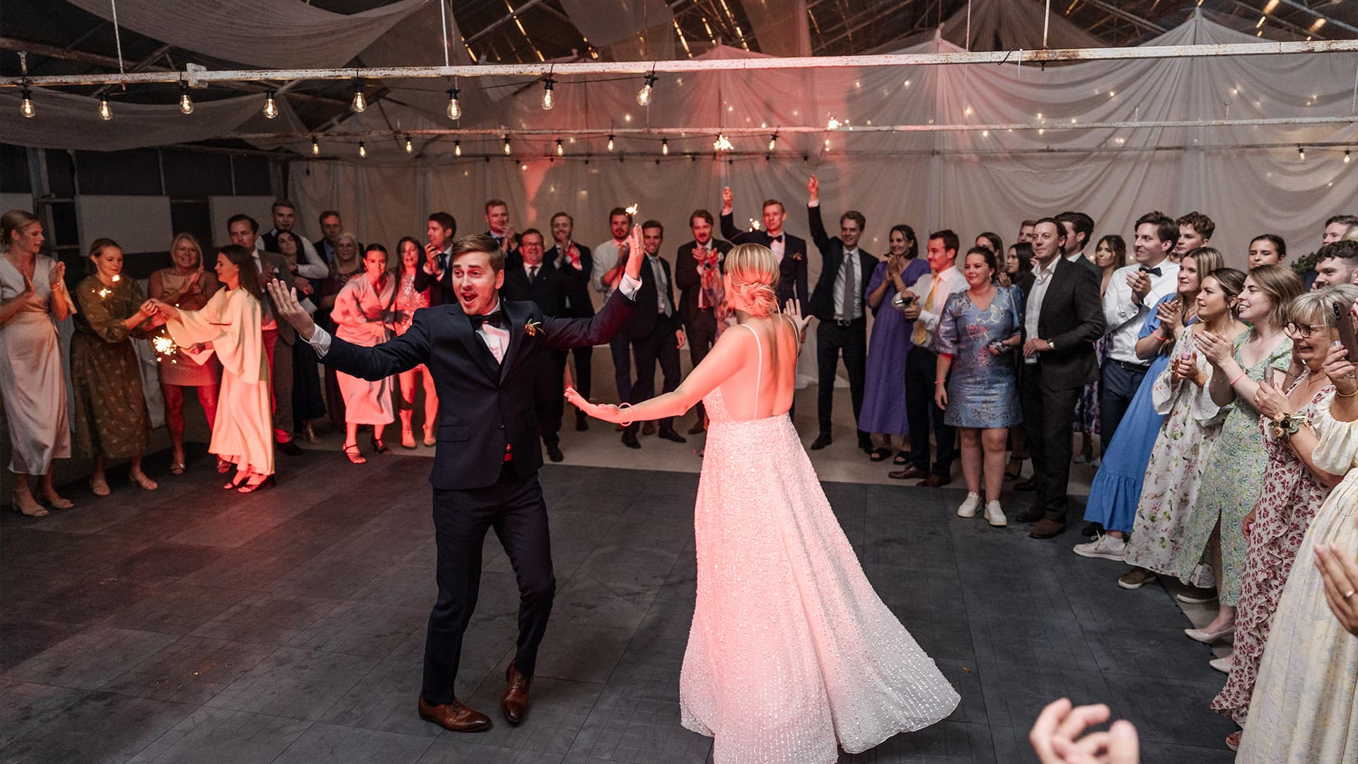 bride and groom dancing at their wedding celebration