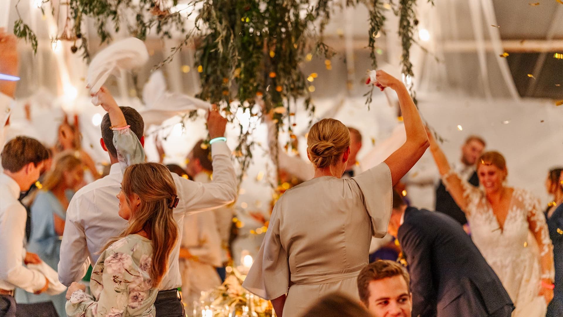 people dancing at a wedding celebration