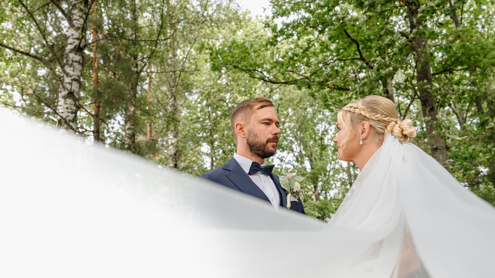 bride and groom in the forest