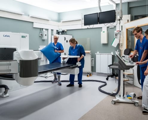 Healthcare personnel working in a X-ray room